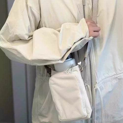The Bottle Sling — Waterproof Crossbody for Phone and Keys