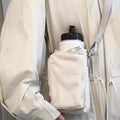 The Bottle Sling — Waterproof Crossbody for Phone and Keys